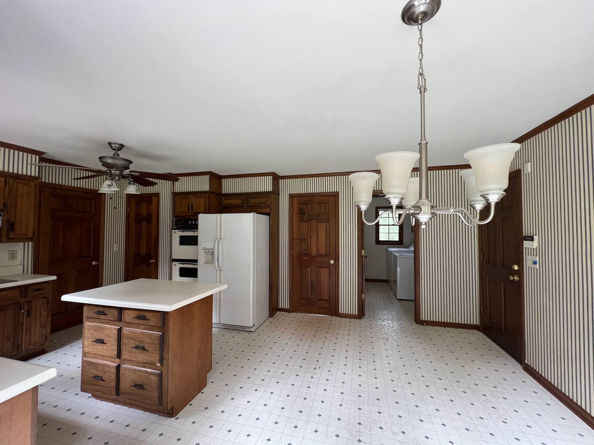 PEACHTREE CORNERS - White kitchen with Green island