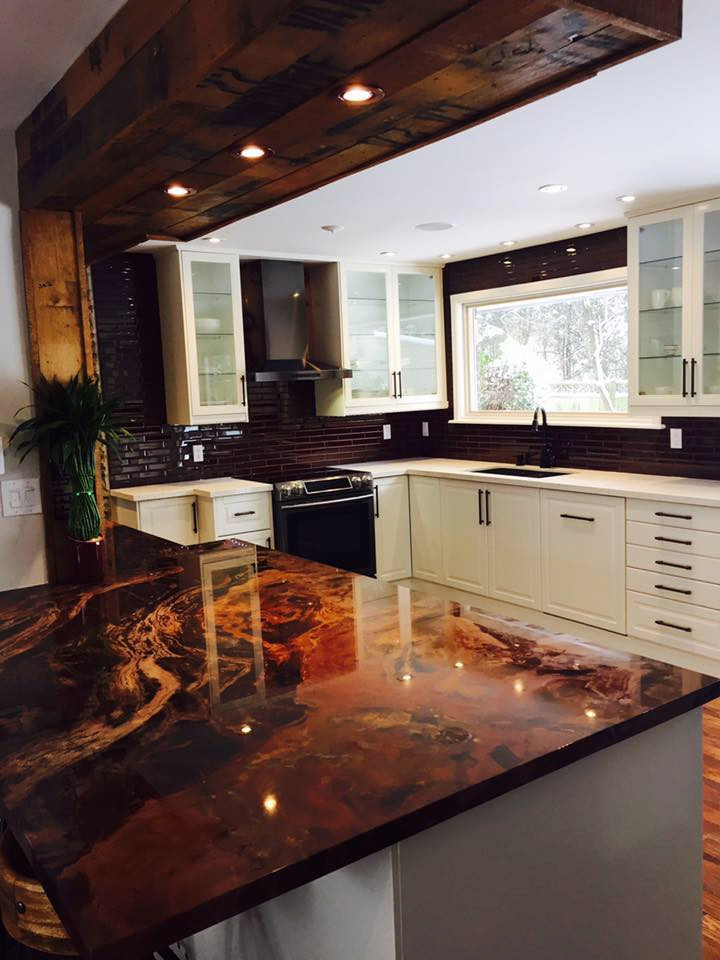 Example of a mountain style kitchen design in Toronto