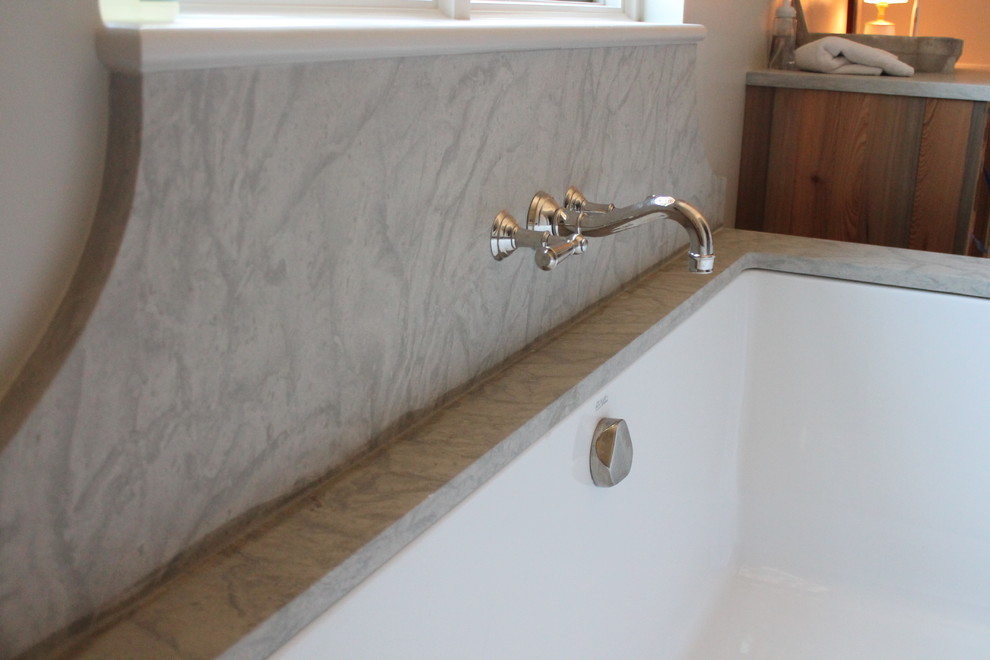 Example of a transitional home design design in Birmingham
