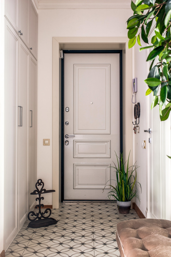 Inspiration for a mid-sized transitional front door in Other with white walls, porcelain floors, a single front door, a white front door and multi-coloured floor.