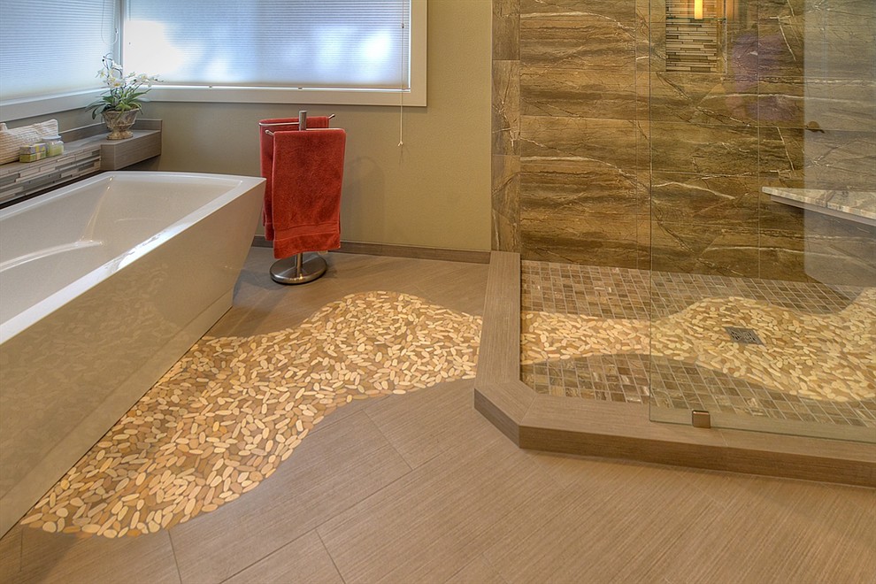 Photo of a large transitional master bathroom in Seattle with a freestanding tub, an open shower, brown tile, grey walls, pebble tile floors, porcelain tile and tile benchtops.