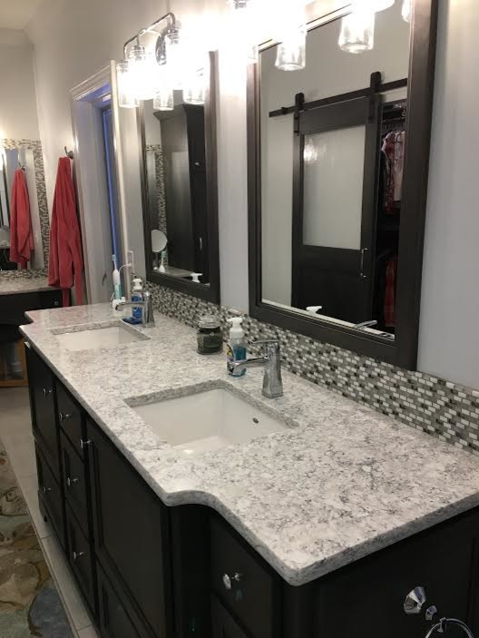 Inspiration for a mid-sized transitional master gray tile and mosaic tile porcelain tile and beige floor alcove shower remodel with recessed-panel cabinets, dark wood cabinets, beige walls, an undermount sink and granite countertops