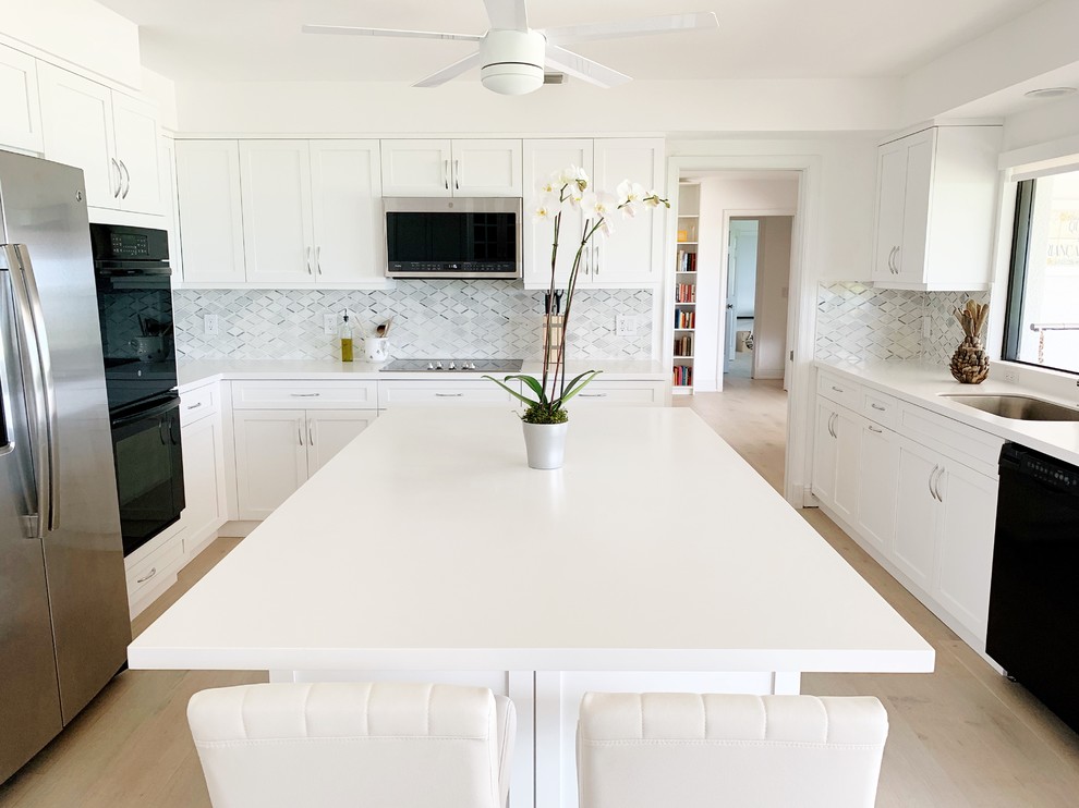 Example of a transitional kitchen design in Miami