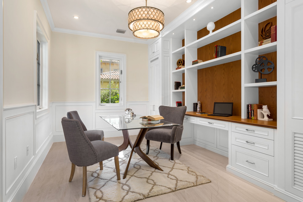 Inspiration for a mid-sized transitional study room in Miami with beige walls, porcelain floors and beige floor.
