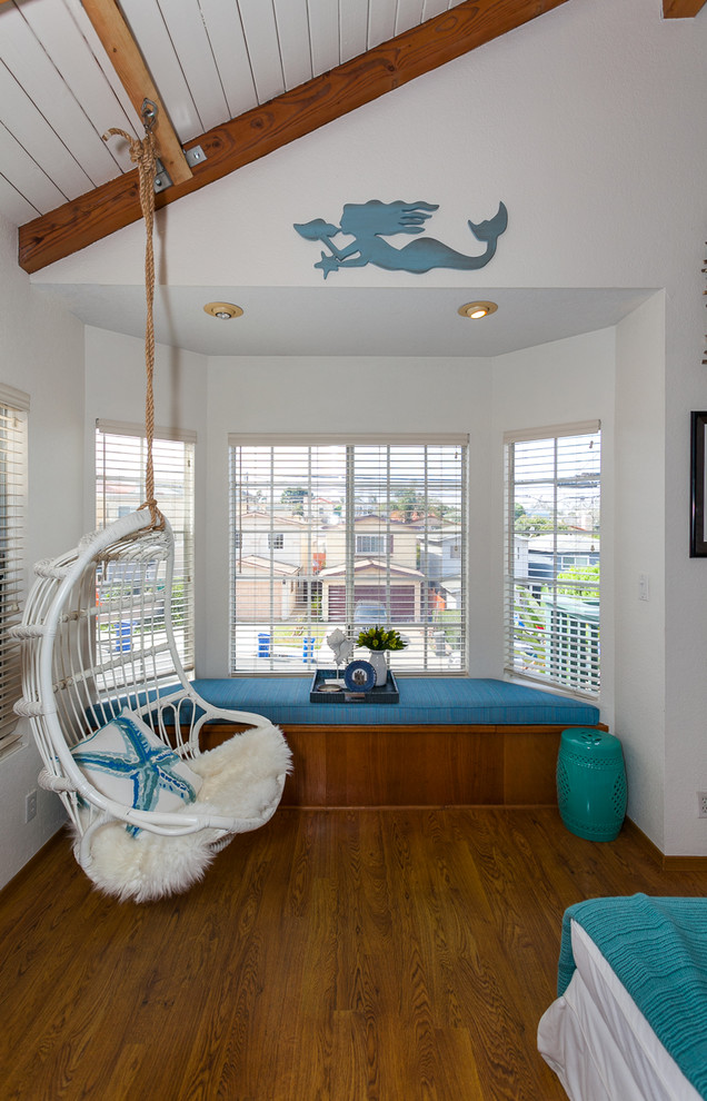 Photo of a small beach style open concept family room in Los Angeles.