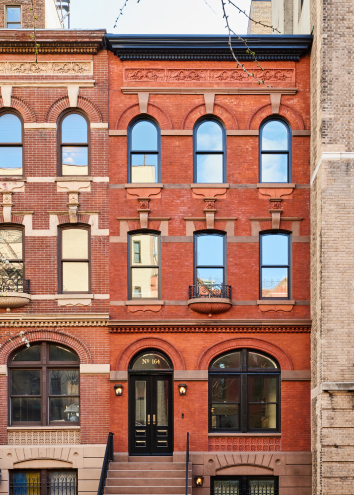 Inspiration for a small brick exterior in New York with four or more storeys.