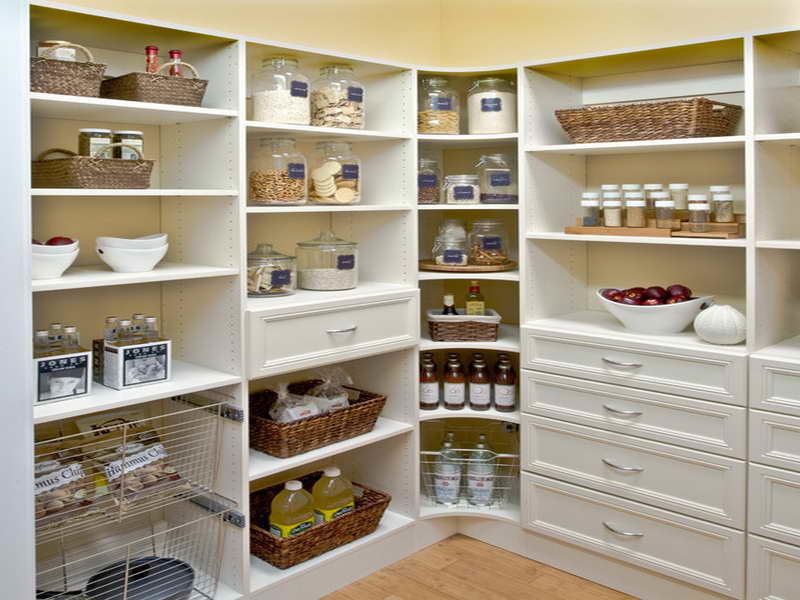 Mid-sized transitional medium tone wood floor and brown floor kitchen pantry photo in New York with recessed-panel cabinets and white cabinets