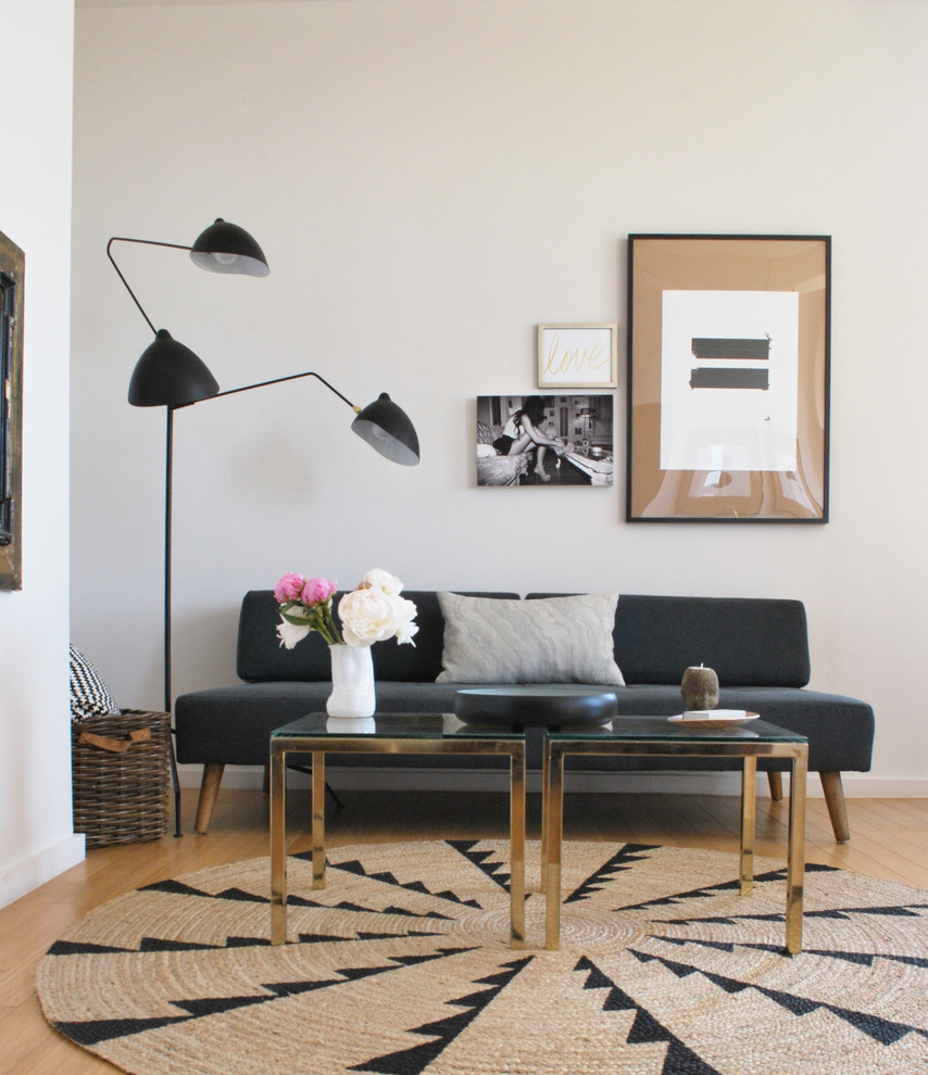 Living room - scandinavian living room idea in New York