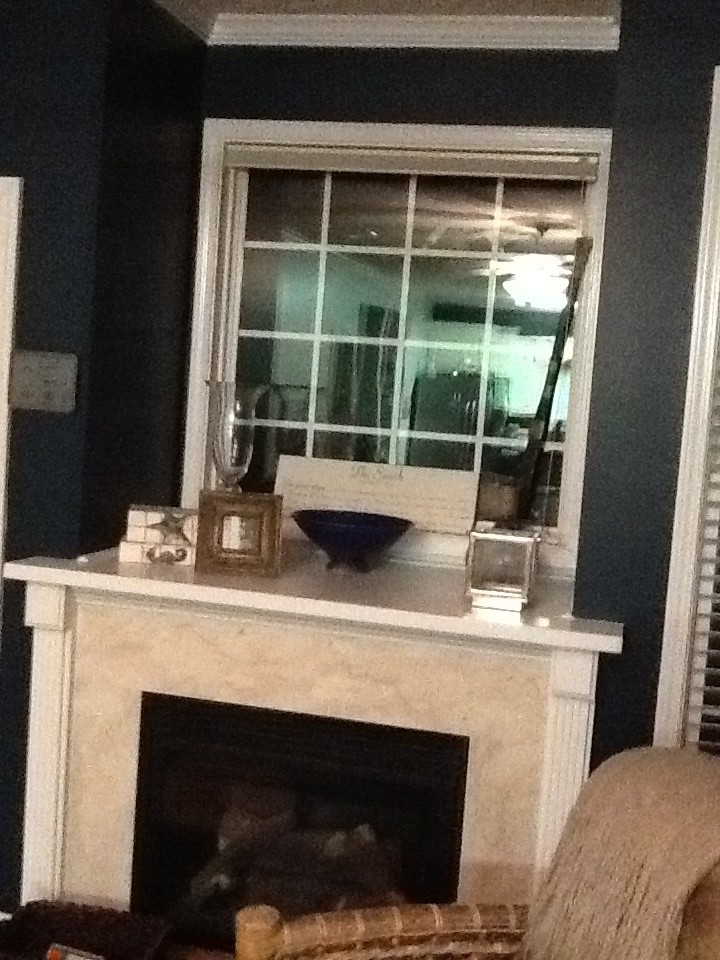 How to decorate this super deep fireplace niche