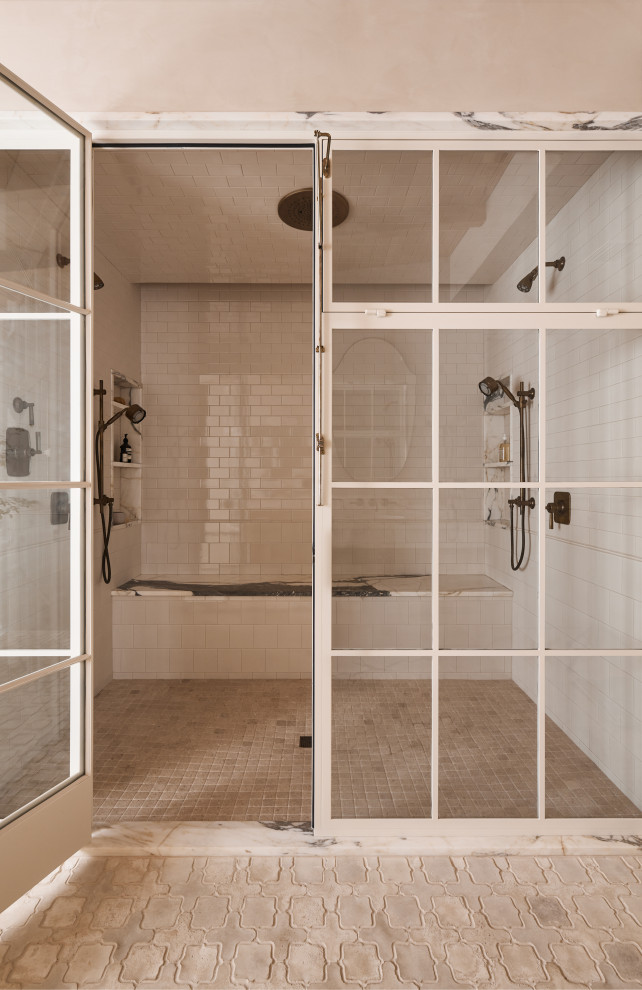 Hill Country Village Legacy Home - Double shower - large transitional master white tile and ceramic tile travertine floor and beige floor double shower idea in Austin with marble countertops, a hinged shower door and white countertops