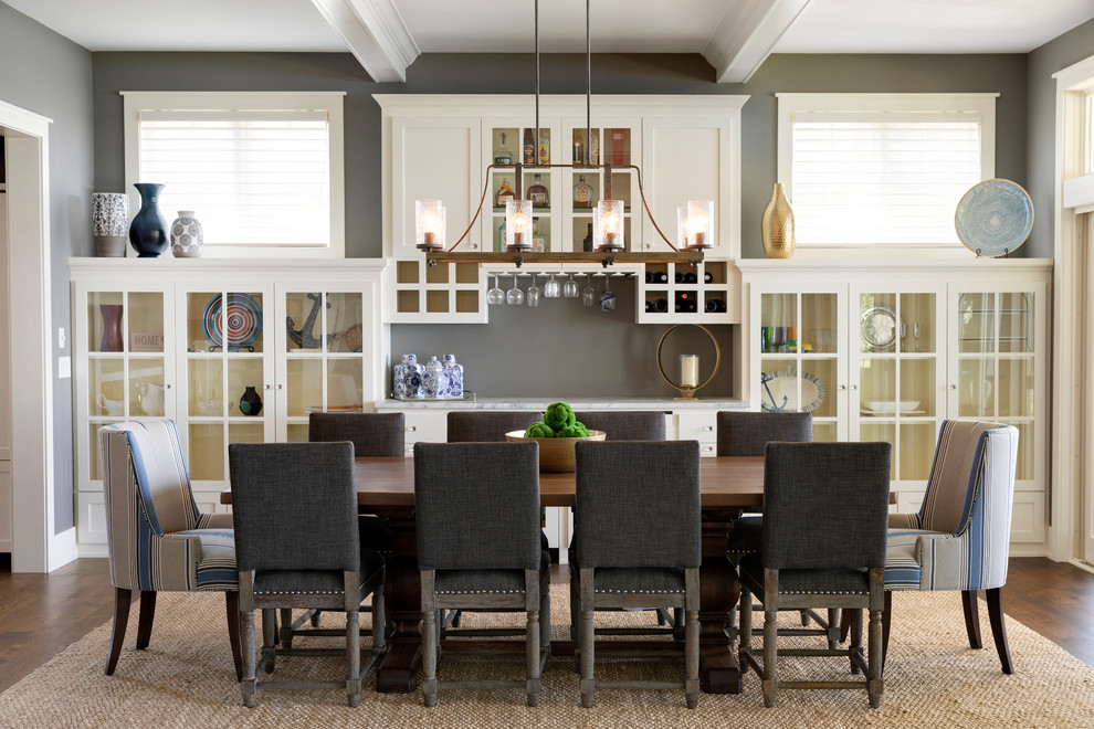 Photo of a beach style separate dining room in Minneapolis with grey walls, dark hardwood floors and no fireplace.