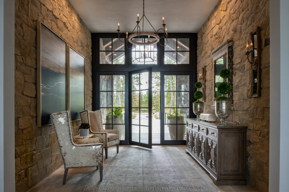 Inspiration for a country entryway in Minneapolis with limestone floors.