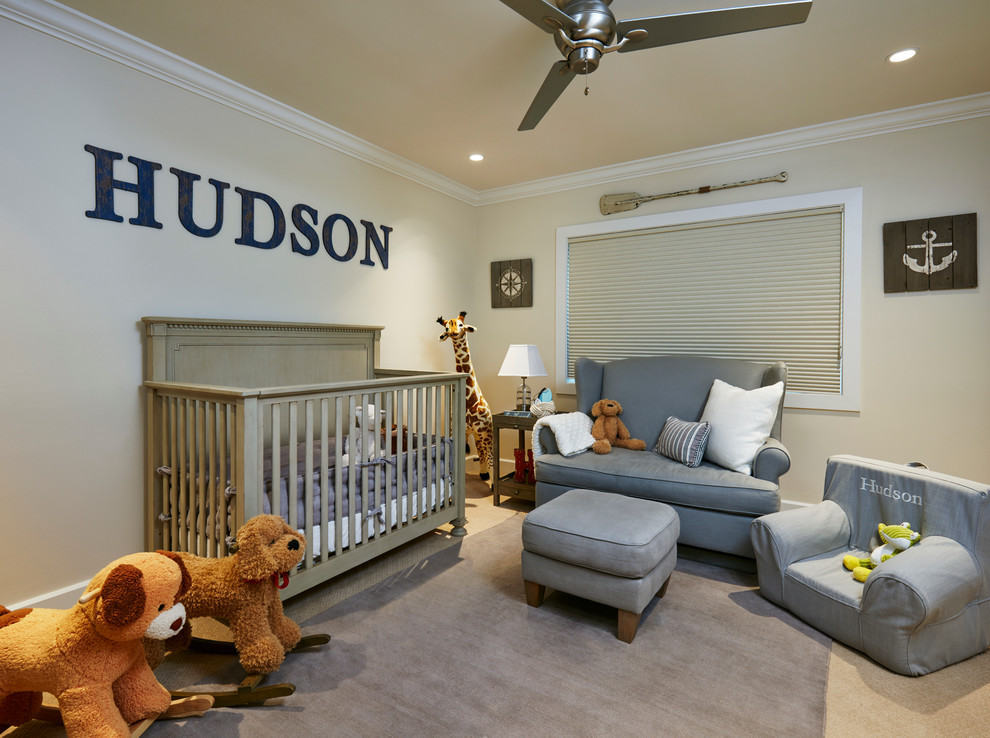 Mid-sized beach style nursery in Miami with beige walls and carpet for boys.