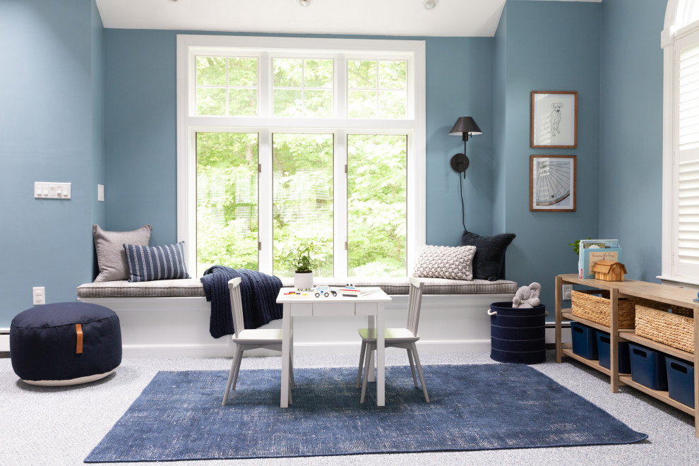 Ispirazione per una piccola cameretta per bambini da 1 a 3 anni minimalista con pareti blu e moquette