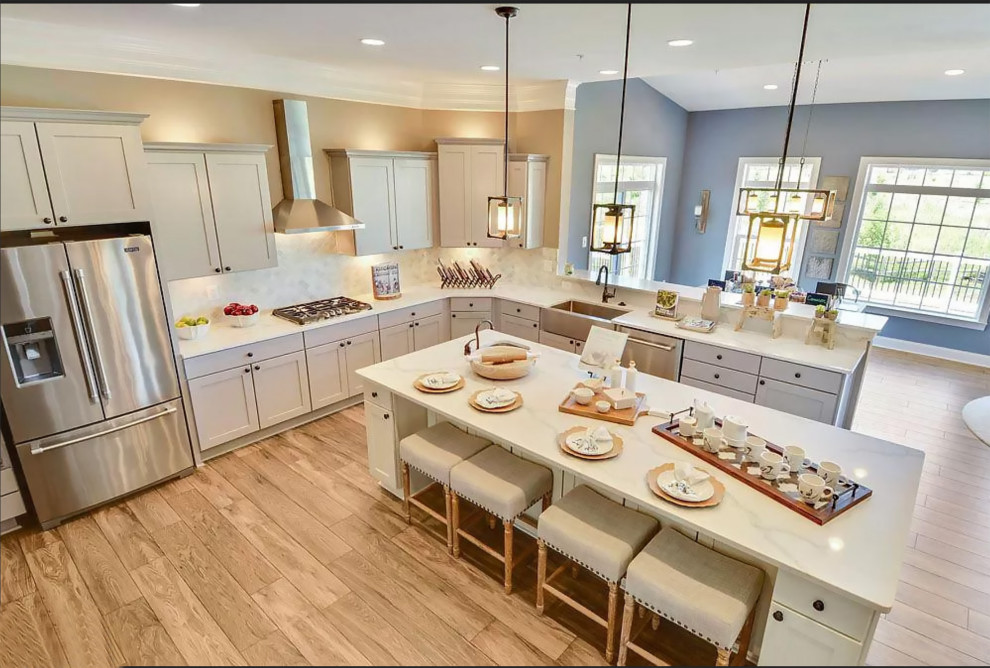 Example of a transitional l-shaped kitchen design in Denver