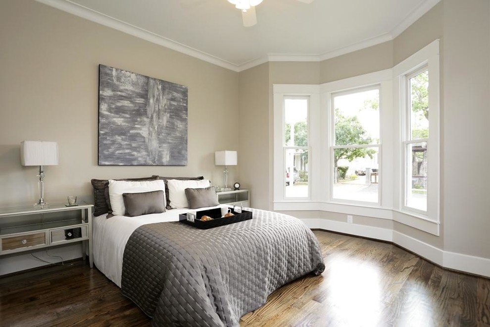 Design ideas for a mid-sized traditional guest bedroom in Denver with grey walls and medium hardwood floors.