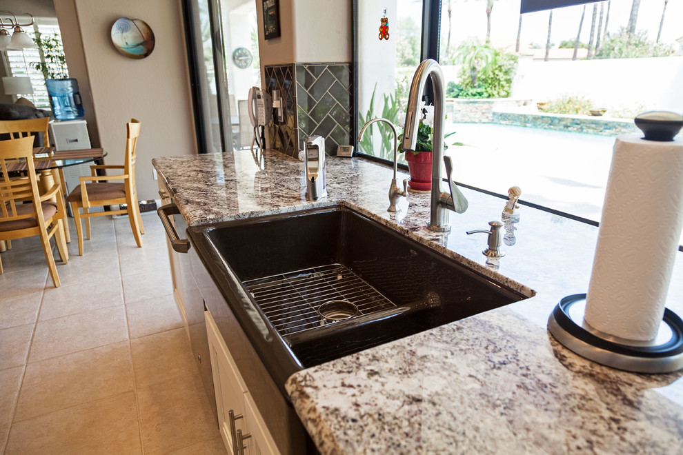 Example of a transitional kitchen design in Phoenix