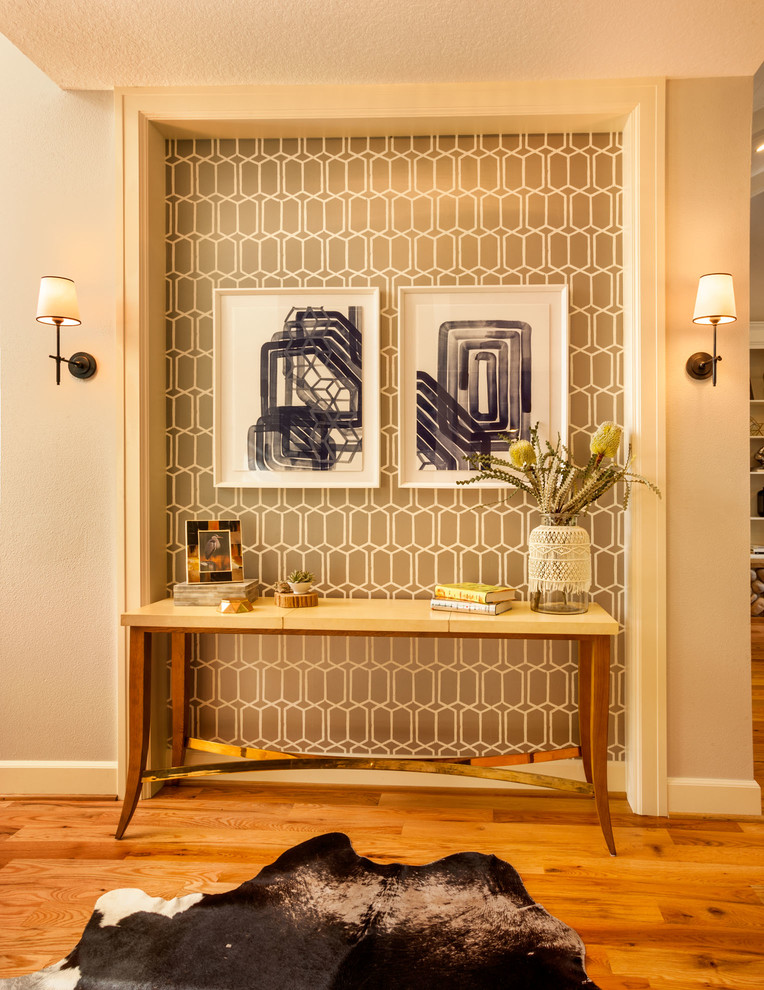 Foyer - large transitional medium tone wood floor foyer idea in Portland with beige walls