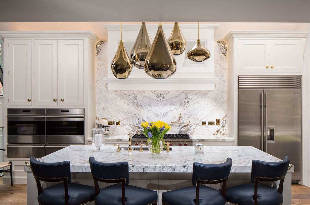 Inspiration for a Large traditional Single-wall kitchen/diner With Recessed-panel Cabinets, White Cabinets, Marble Worktops, Multi-coloured Splashback and an Island.