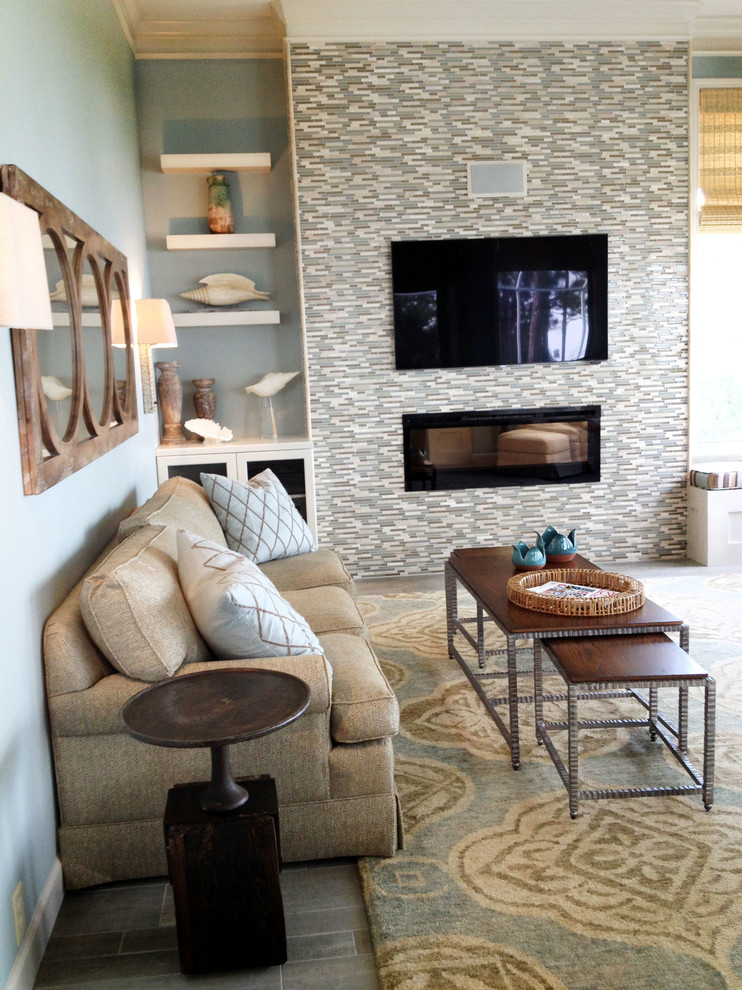 This is an example of a beach style family room in Miami.