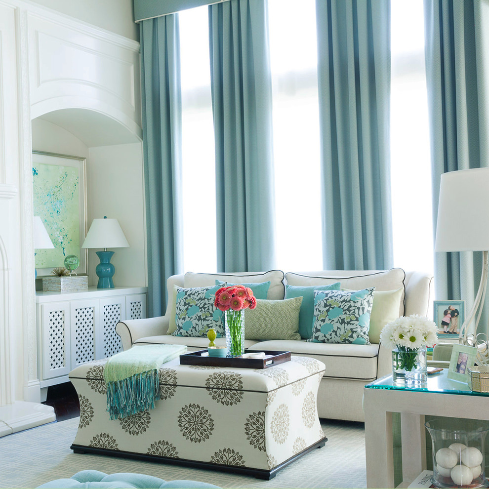 The Davis Home - Family Room - Design with the family in mind with Crypton upholstery fabric and indoor/outdoor fabrics. Custom media wall made to fit the TV and add a very finished look. Blue drapery with tailored cornice and custom sized broadloom rug.