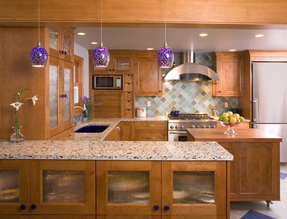 This is an example of a traditional kitchen in Seattle with stainless steel appliances.