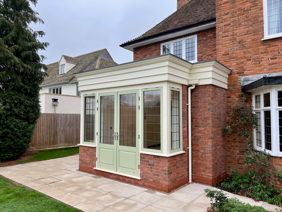 Traditional sunroom in West Midlands.