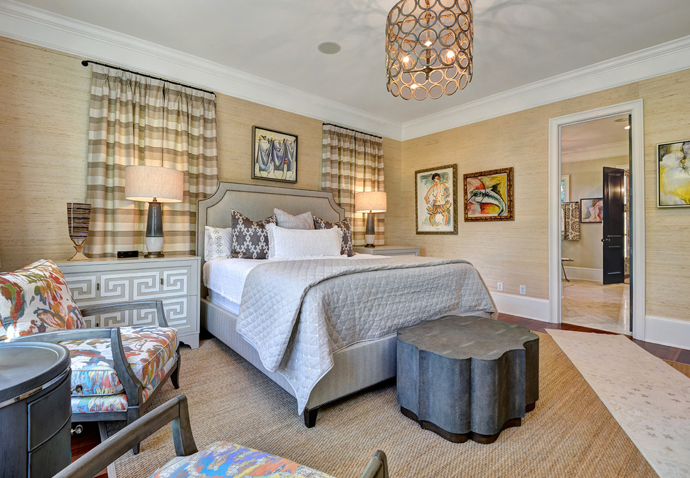 Transitional bedroom in Charleston with beige walls and dark hardwood floors.