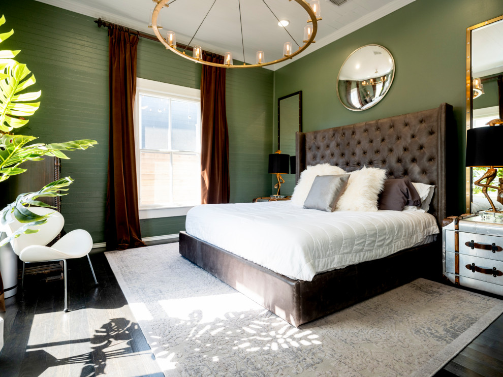 Inspiration for a transitional bedroom in Austin with green walls, dark hardwood floors and black floor.