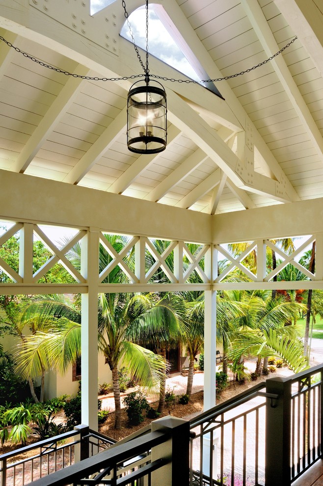 Design ideas for a tropical verandah in Miami with a roof extension.
