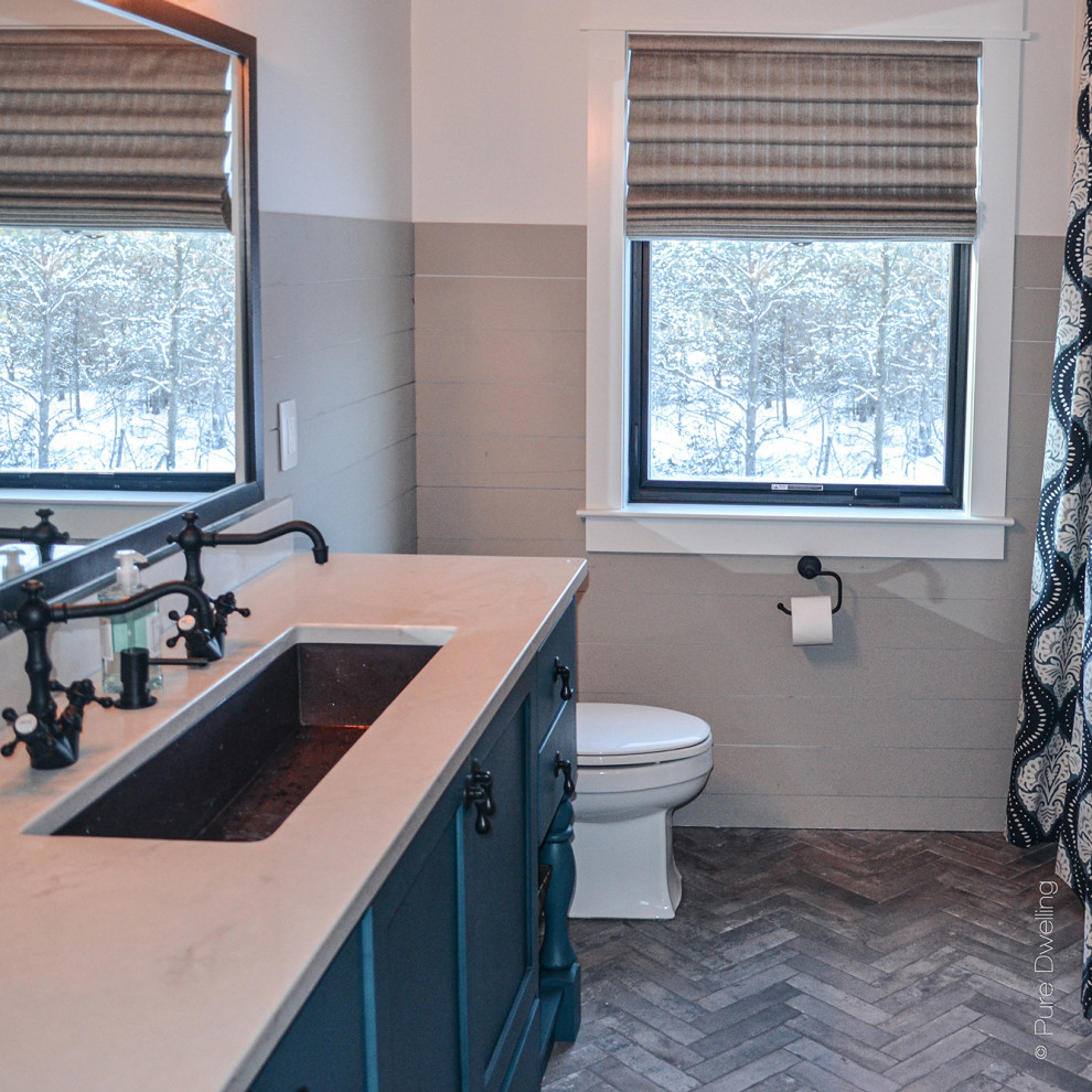 Large country bathroom in Chicago with shaker cabinets, turquoise cabinets, an alcove tub, grey walls, ceramic floors, a vessel sink, engineered quartz benchtops, grey floor, white benchtops, a single vanity, a freestanding vanity, vaulted and planked wall panelling.