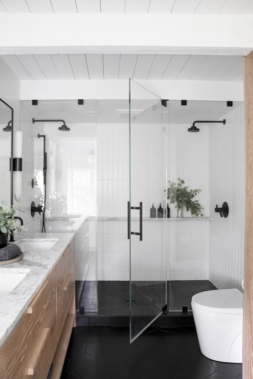 Modern Walk-in Shower with White Wall Tiles and Black Floor