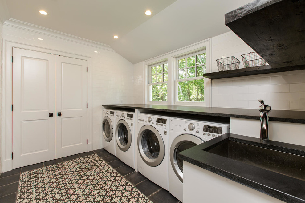 This is an example of a beach style laundry room in New York.