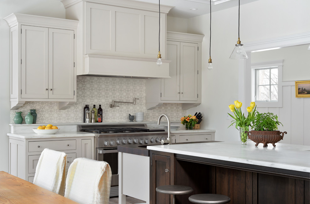 Photo of a transitional kitchen in Portland Maine.