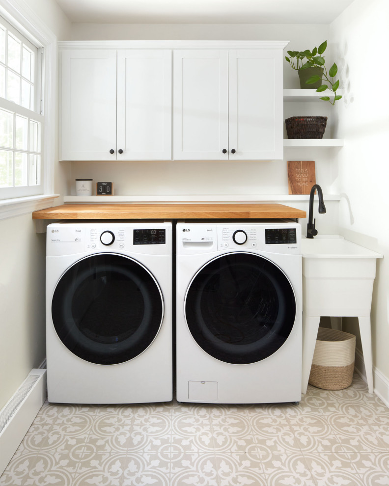 Transitional laundry room in Philadelphia.