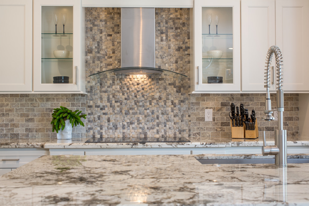 Example of a large transitional l-shaped open concept kitchen design in Miami with an undermount sink, flat-panel cabinets, white cabinets, quartzite countertops, multicolored backsplash and an island