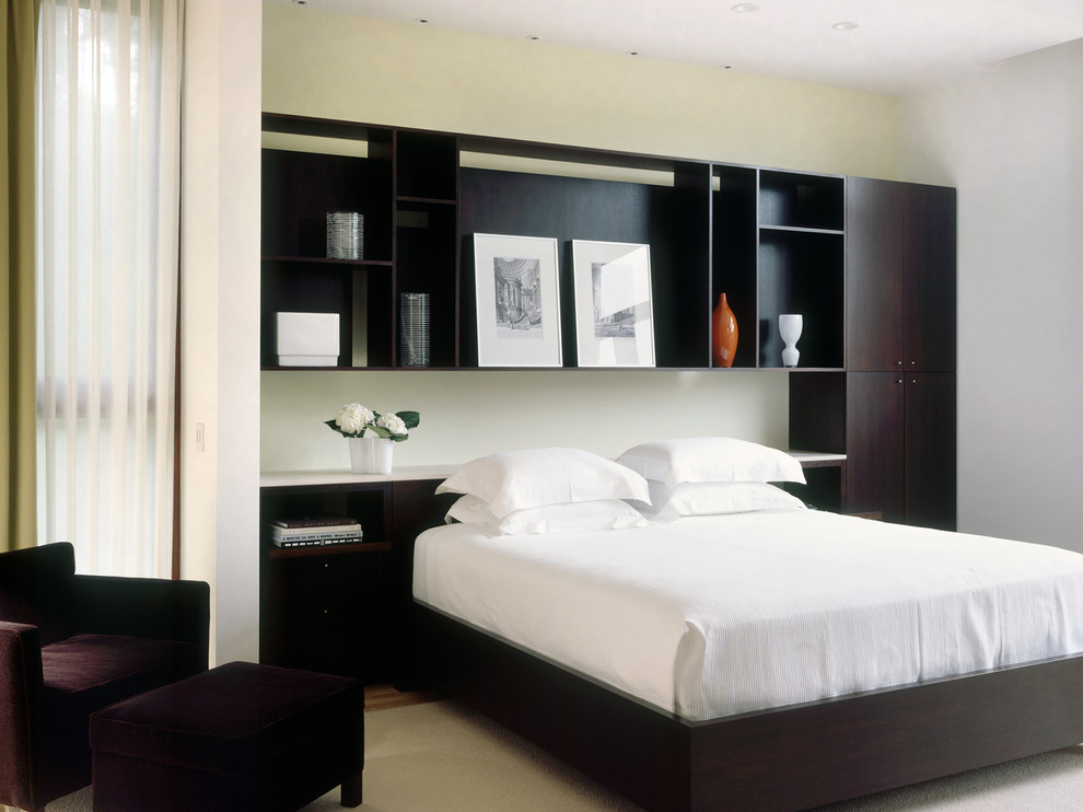 Example of a trendy master bedroom design in Nashville with white walls and no fireplace