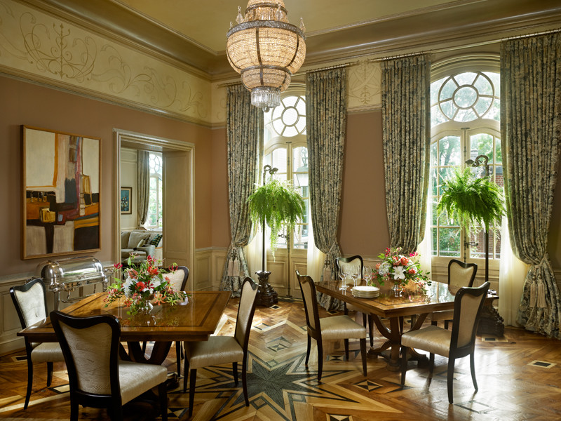 Inspiration for an expansive mediterranean separate dining room in Chicago with medium hardwood floors.