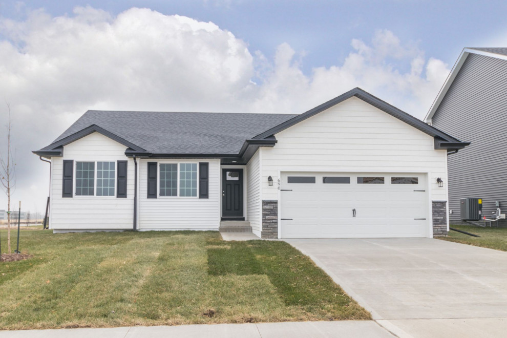 Large transitional white one-story concrete fiberboard gable roof idea with a shingle roof