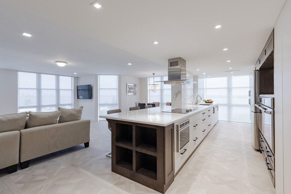 This is an example of a contemporary kitchen in Miami with with island.