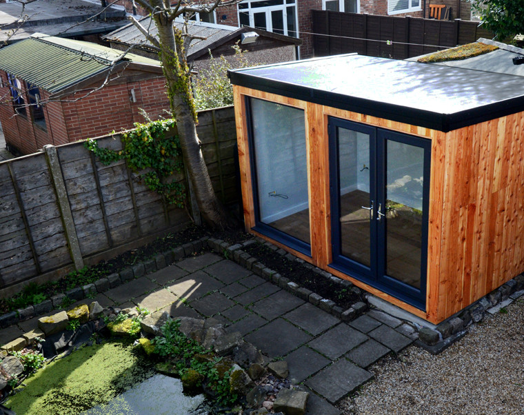 This is an example of a medium sized modern detached office/studio/workshop in Cheshire.