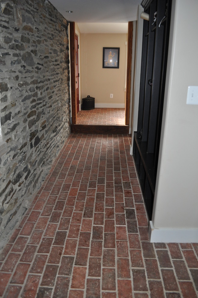 This is an example of a traditional hallway in Philadelphia with red floor.