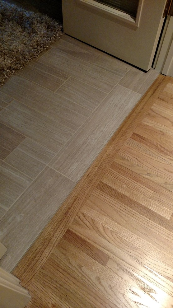 Inspiration for a transitional ceramic tile home design remodel