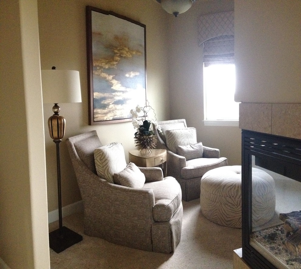 Example of a transitional home design design in Denver