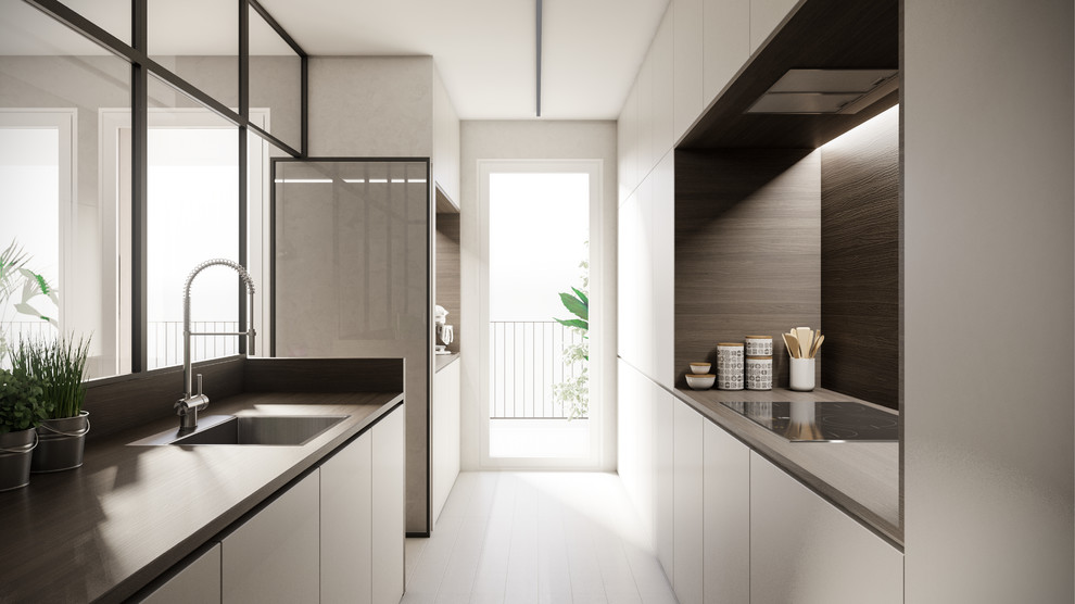 Photo of a mid-sized modern galley separate kitchen in Milan with flat-panel cabinets, wood benchtops, timber splashback, porcelain floors, with island, grey floor, a single-bowl sink, white cabinets, brown splashback, panelled appliances and brown benchtop.