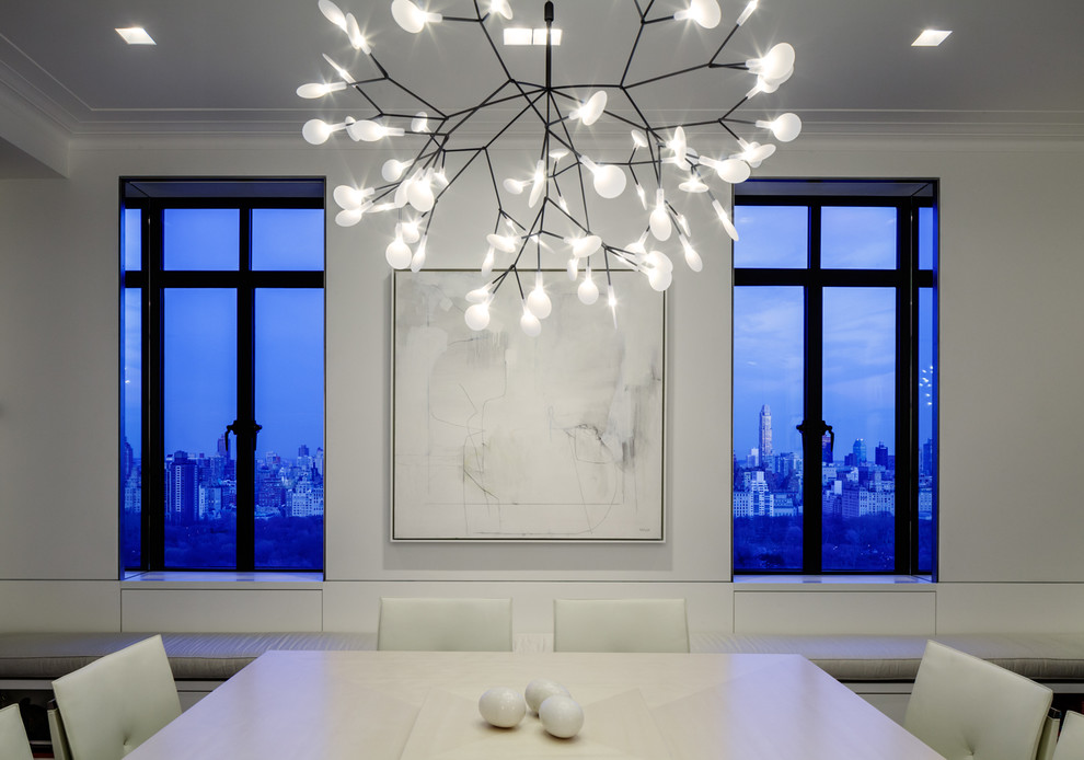 Inspiration for a large modern open plan dining in New York with white walls.