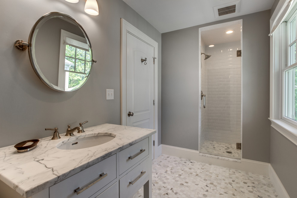 Bathroom - mid-sized transitional 3/4 white tile bathroom idea in Boston with white cabinets and gray walls