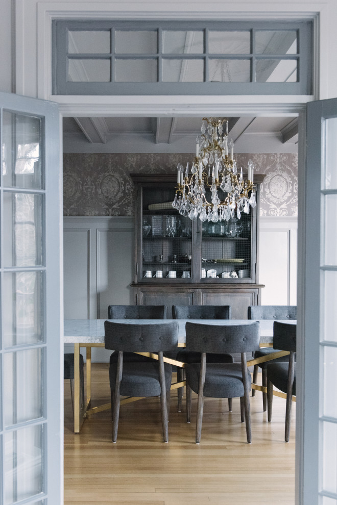 Transitional separate dining room in Other with grey walls, light hardwood floors, beige floor, exposed beam, decorative wall panelling and wallpaper.