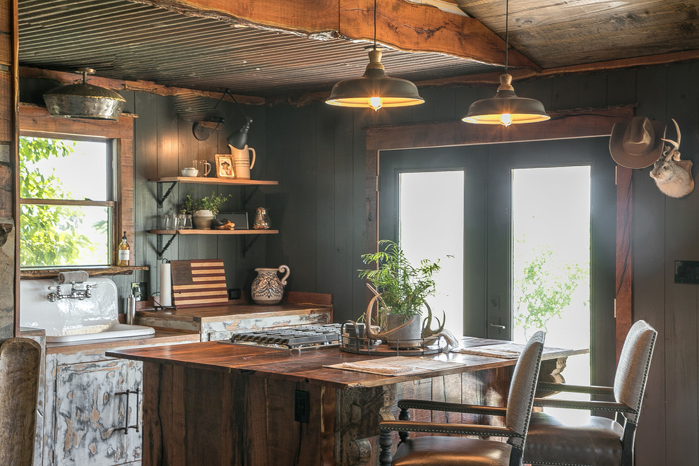 Inspiration for a rustic home design remodel in Austin