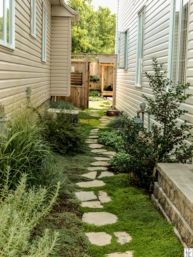 Inspiration for a mid-sized asian backyard full sun xeriscape for summer in Ottawa with decking.